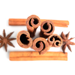 Cinnamon sticks isolated on white background, close-up, top view