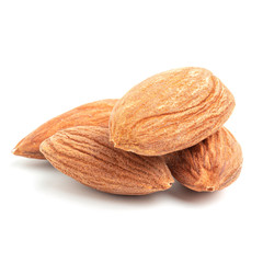 Almonds isolated on white background, close-up view