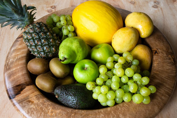 Pineapple, apple, pear, grapes, melon and Avocado