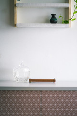 houseplant and decorations on white pine wooden shelf