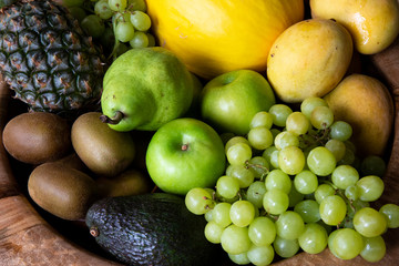 Pineapple, apple, pear, grapes, melon and Avocado