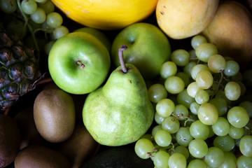 Pineapple, apple, pear, grapes, melon and Avocado