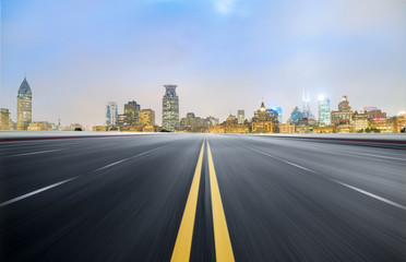 Dynamic blurry highway and city skyline in Shanghai, China