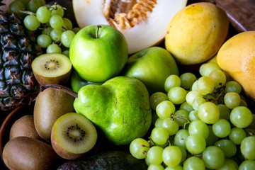 Pineapple, apple, pear, grapes, melon and Avocado