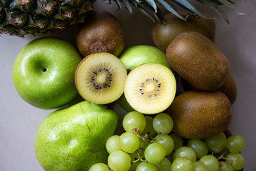 Pineapple, apple, pear, grapes, melon and Avocado