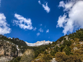 natural beautiful mountains view, hiking in mountains, clouds and forest