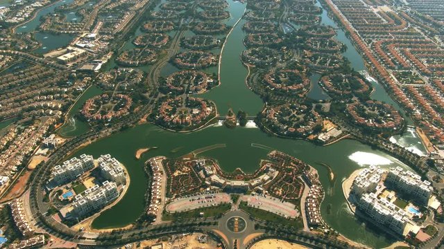 Aerial view of luxury Jumeirah Islands and Jumeirah Park communities in Dubai, United Arab Emirates UAE
