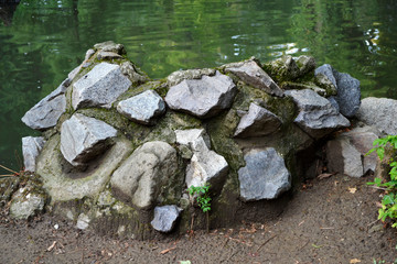 Rock beside the water