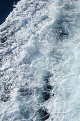 Fototapeta na wymiar Vertical foamy sea