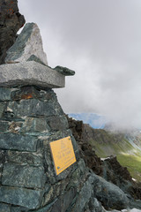 Pyramide indicating the pass Col Loson in Italian Alps.