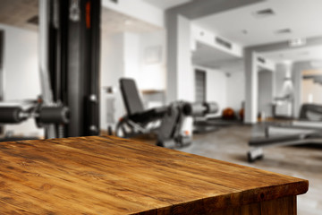 Desk of free space and gym interior 