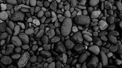 black stone background, pebble beach surface