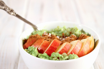 Breakfast with oatmeal and fruit.