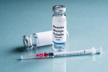 Measles Mumps Rubella Vaccine Vials With Syringe