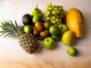 Pineapple, apple, pear, grapes, melon, honeymelon and Avocado