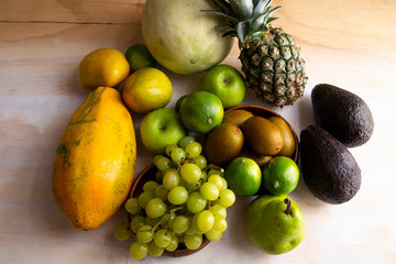 Pineapple, apple, pear, grapes, melon, honeymelon and Avocado