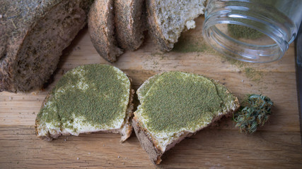Close-up of bread with hemp flour, sandwich with cannabis butter and hashish