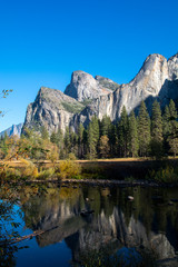 Bright cliffs and Merced river. Amazing natural view in Yosemite valley. 