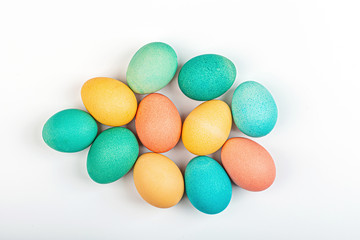 Stylish background with colorful easter eggs isolated on white background. Flat lay, top view, mockup, overhead, template