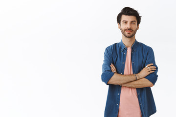 Stylish hipster boyfriend with bristle, consider visit barber shop, change looks, cross arms over...