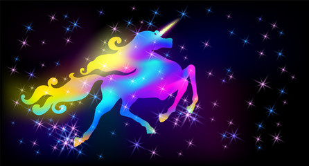 Galloping iridescent unicorn with luxurious winding mane prancing against the background of the fantasy universe with sparkling stars © Marisha
