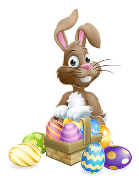 The Easter Bunny with a basket hamper full of Easter eggs cartoon