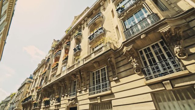 Authentic Architecture in Paris, France. Low Angle View on Buildings While Walking on Street on Summer Day