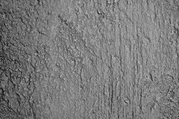 rough texture of abstract decorative black gray background of plaster wall