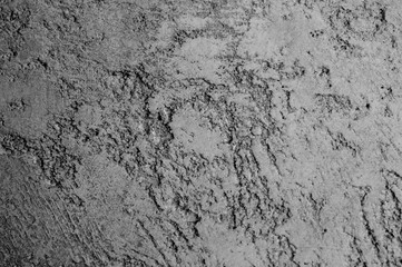 rough texture of abstract decorative black gray background of plaster wall