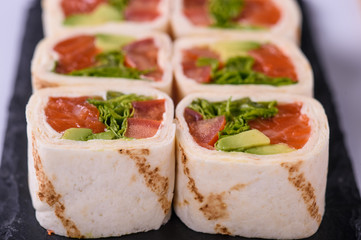  pita roll cut as a roll on a white background 6