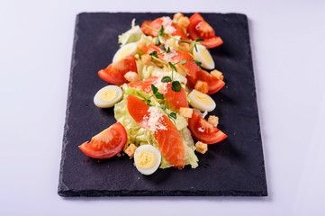 Caesar salad with parmesan and salmon8