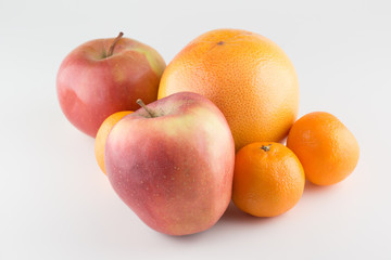 Apples and Orange Isolated on a White Background
