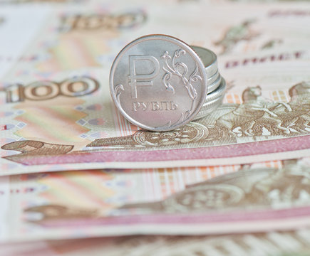 Money. Russian rubles coins and 100  rubles bills