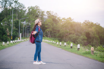 Happy young asian girl at Kang Kra Chan National Park Thailand