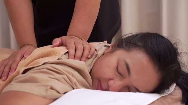 Thai body massage by therapist in salon spa,4K