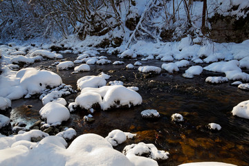 The Kamacnik River covered in deep snow, Croatia