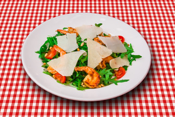 Caesar salad with shrimps and parmesan cheese