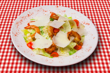 Caesar salad with shrimps and parmesan cheese