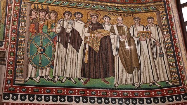 Ravenna, Italy, December 2019. Inside the basilica of San Vitale, footage with tilt movement on the detail of the representation of the Byzantine emperor Justinian.