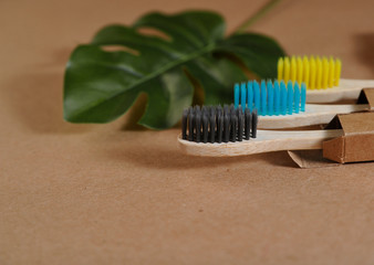 Bamboo toothbrushes on craft paper. Eco concept. Zero waste.