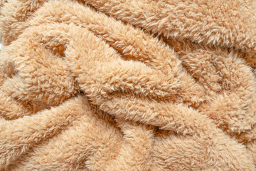 Natural fiber thermal fur wool texture background from sheep with white bright color tone. Backdrop for design art work or text message.