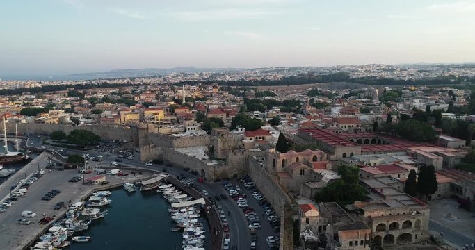 Aerial footage of Rhodes island old fortified town, Palace of the Grand Master, a popular tourist destination, Dodecanese, Aegean, Greece