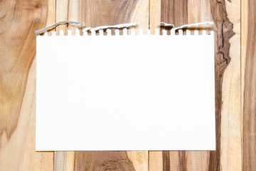 Empty white paper sheet on brown cork board surface for background, add text. Concept School.