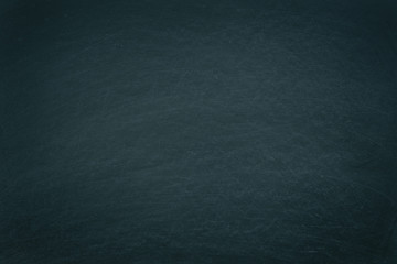 Working place on empty rubbed out on green board chalkboard texture background for classroom or wallpaper, add text message.