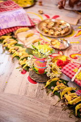 Bengali marriage rituals with beautiful decoration of clay pot and series of bananas for bride and groom in India