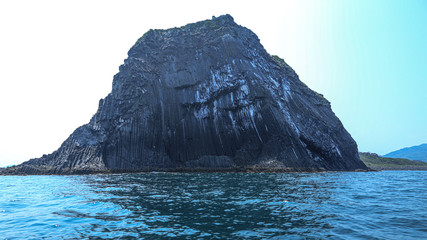 rock mountain on the sea