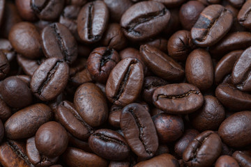 Coffee beans close-up. Roasted coffee beans as a background.