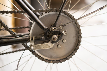 Fototapeta na wymiar Detail of back rack in old bicycle wheel