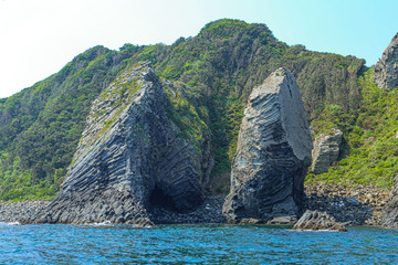 rock mountain on the sea