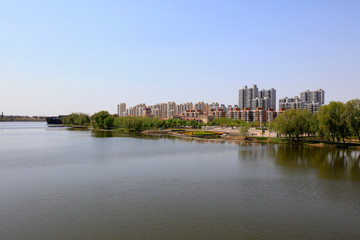 Fototapeta na wymiar Waterfront City Scenery, China